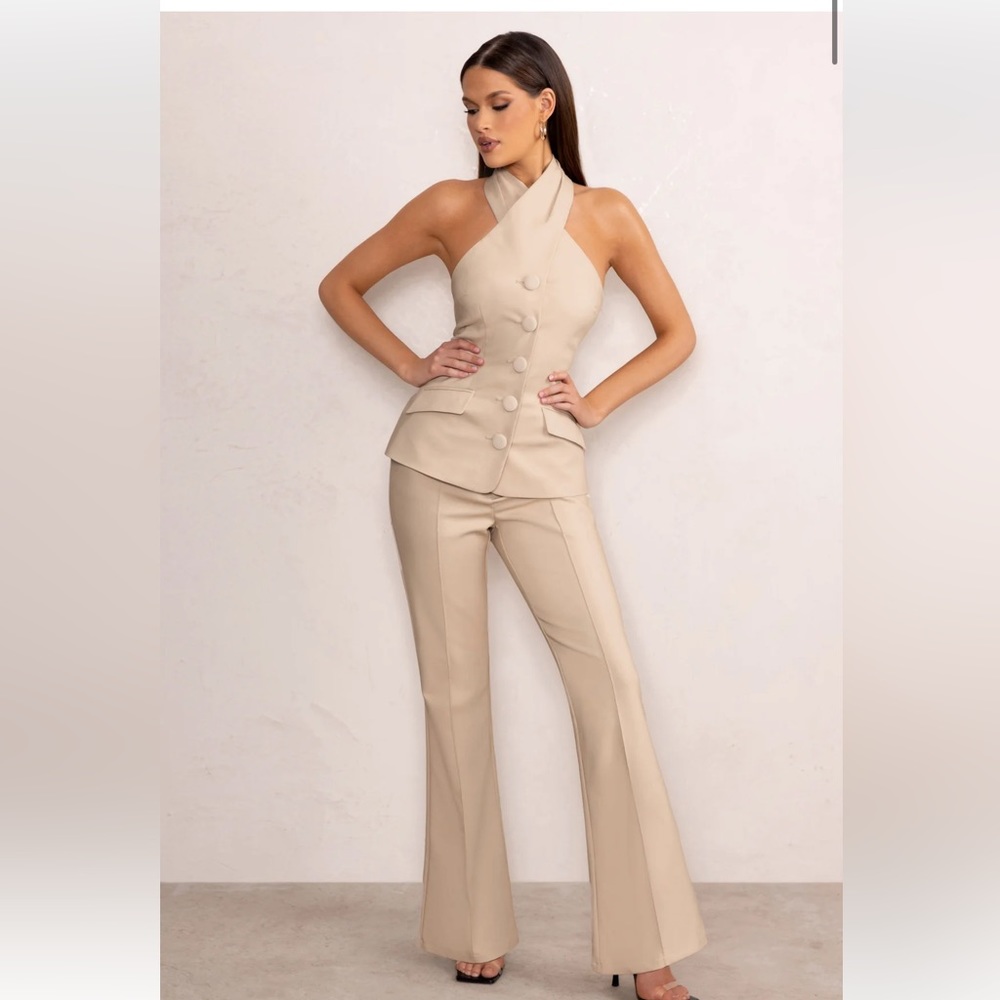 Classy two piece suite. Halter cross/ cross top and tailored bottoms